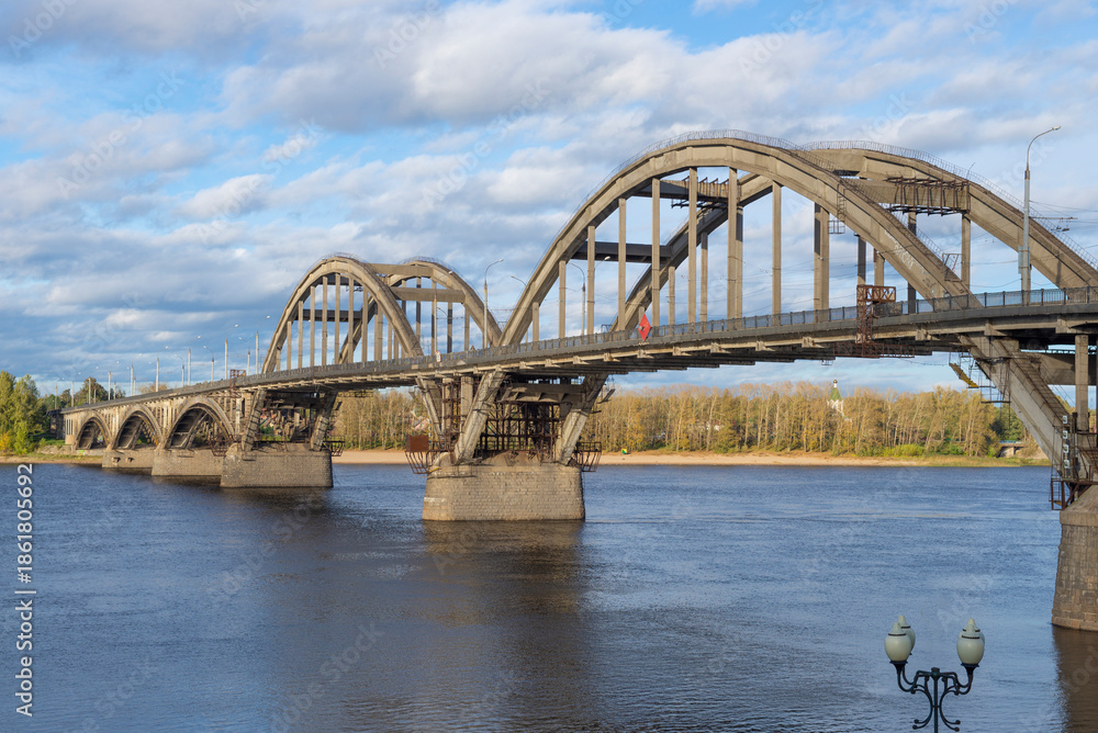 Fototapeta premium View of the automobile bridge over the Volga river on a sunny September day, Rybinsk