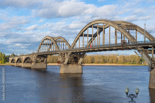 View of the automobile bridge over the Volga river on a sunny September day, Rybinsk