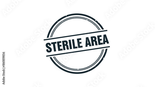 A dark blue circular grunge stamp icon prominently featuring bold sans serif text indicating a sterile area within a medical or clean environment setting