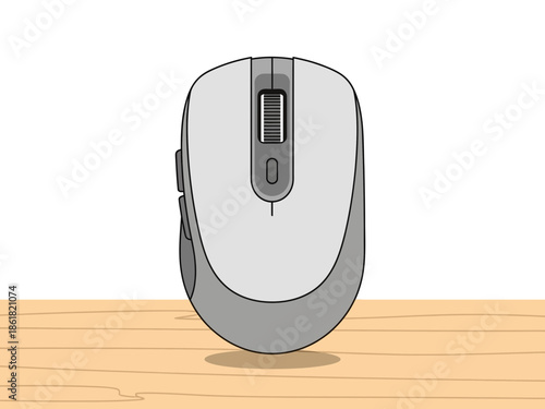 A computer mouse on a wooden table viewed from the front
