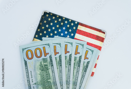 United States of American passport with cash. US Passport and Dollars, the US passport with dollar bills, Citizenship, nationality, traveling document, fees, currency, USA. High quality photo