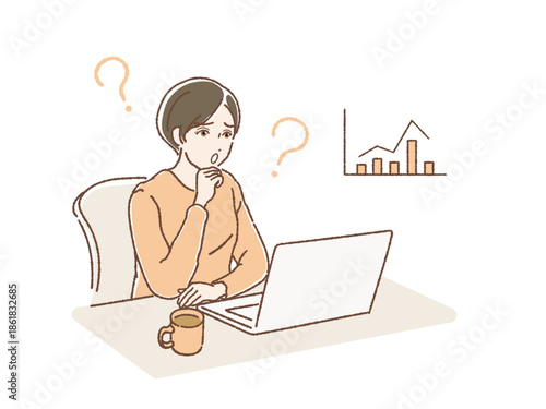 パソコンでチャートみる不安そうな女性
