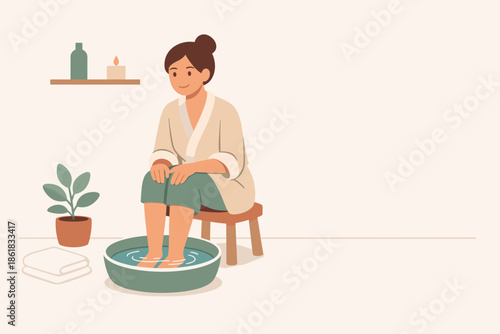 Young woman relaxing with feet in warm water at home spa  