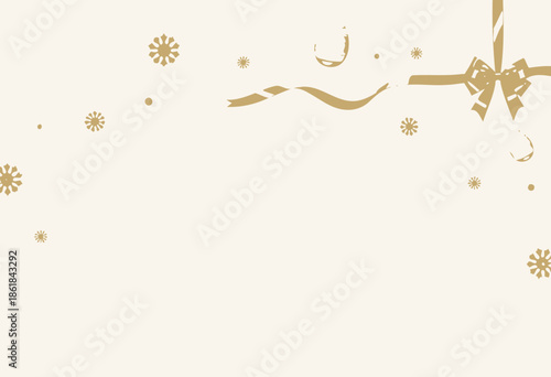Elegant festive composition with golden ribbon and decorative floral accents on a soft white background creating a sense of luxury and celebration