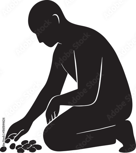 silhouette of a man stooped toward the beans