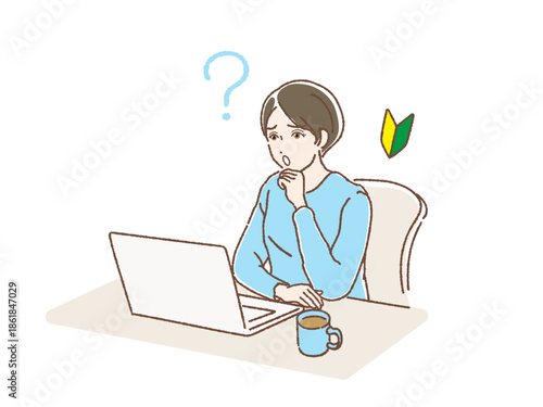 ノートパソコンを開いて困っている女性