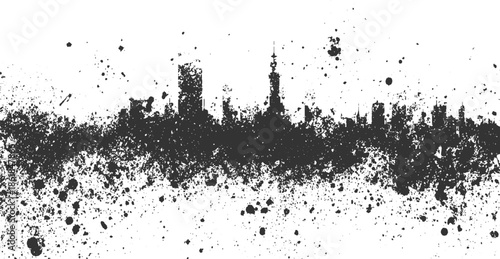 Dark silhouette of a city skyline with scattered ink splatters and grunge texture urban