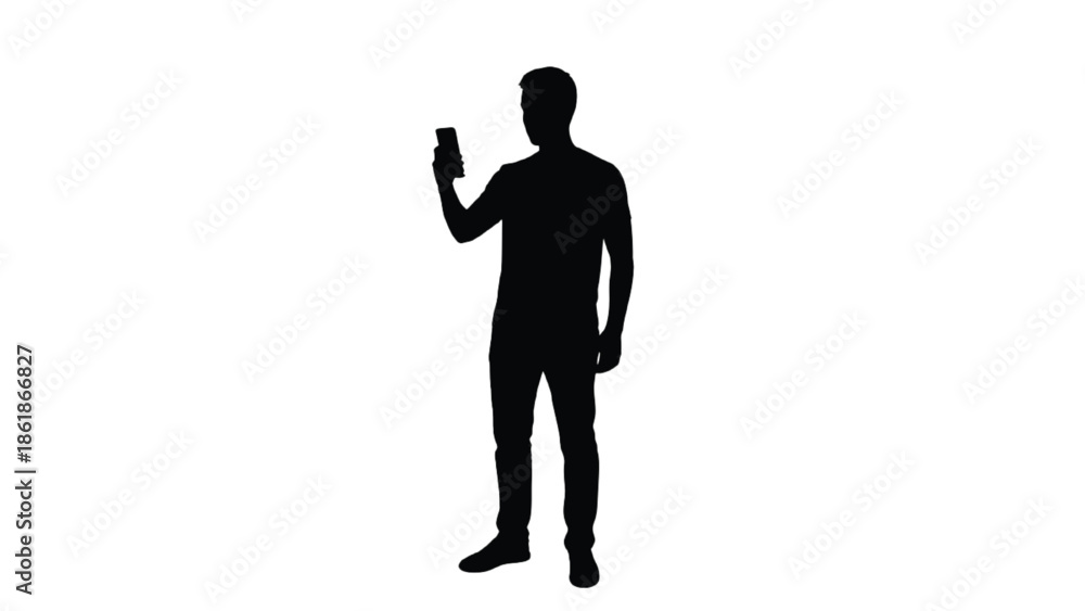 Obraz premium Silhouette of a man using a smartphone male person