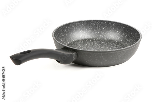 Side profile of empty non-stick frying pan isolated