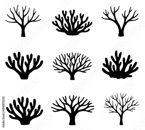 Hand drawn bare tree silhouettes set featuring different stylized plant forms and bushes for nature-themed designs