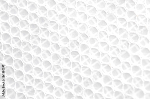 Fotografie White Hexagonal Mesh Fabric Background with Repeating Honeycomb Pattern