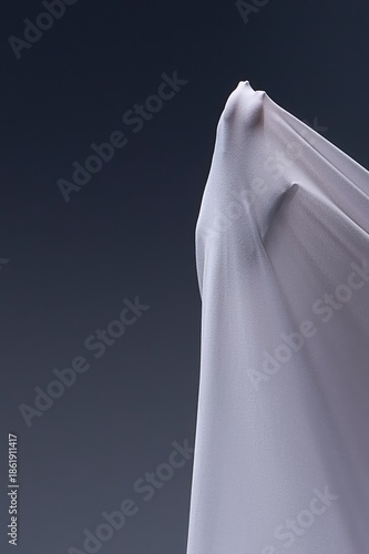 Wallpaper Mural A human hand presses against taut white fabric, creating an abstract, sculptural form against a dark gray background. Torontodigital.ca