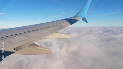 Cloudscape from the porthole. Flight. Airplane. Travel concept
