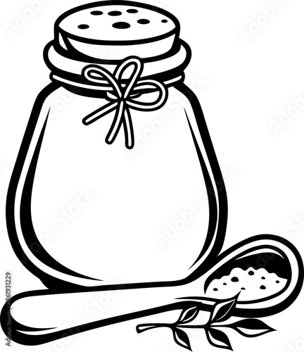 Salt container with wooden spoon and salt grains, spice seasoning ingredient for cooking and food preparation