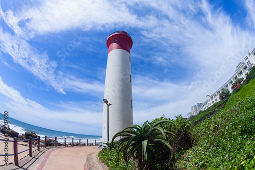 Lighthouse Building Beach Ocean Blue Sky Ship Safety Coastline