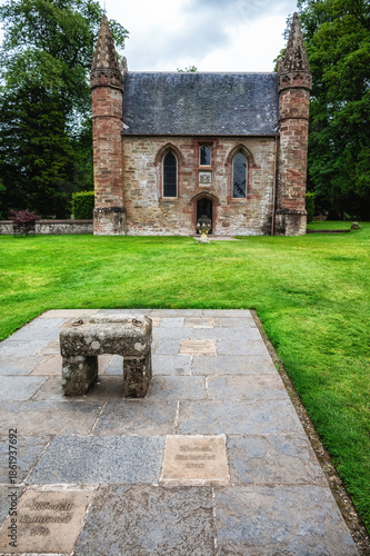 The chapel on Moot Hill with a replica of the stone of Scone in front, Scone Palace, Perth, Scotland