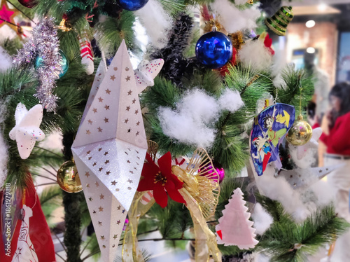 Jaipur, India 24 December 2025: Picture of Christmas tree decoration in shopping mall, Christmas tree with ornaments

