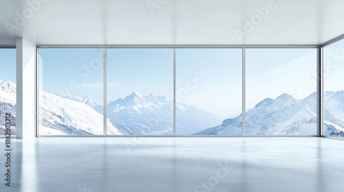 Artificial space of an empty exhibition hall under snow-capped mountains