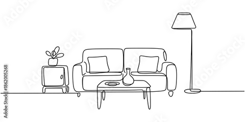 A minimalist living room with a simple couch and coffee table