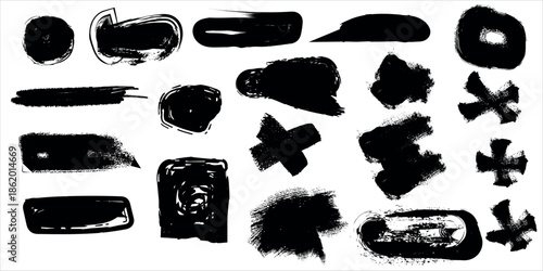A collection of 20 abstract black ink shapes on a white background with varying sizes and irregular forms