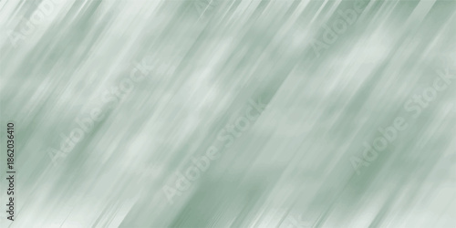 Abstract diagonal brush stroke texture in muted green and white creating a soft, organic, and flowing background pattern with subtle variations in tone and light, perfect for design elements