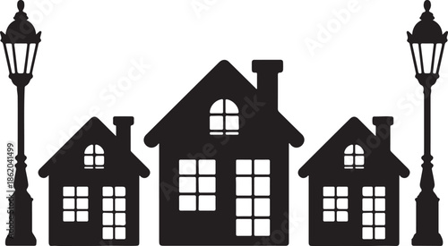 Winter village street with houses and lampposts