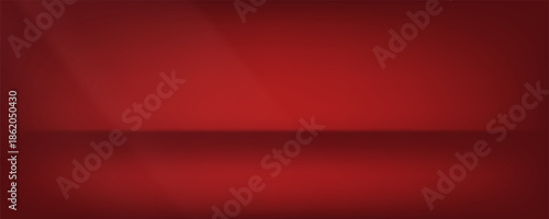 Dark red background with subtle highlight effect. The spotlight creates a gradation from bright red in the center to dark red at the edges.
