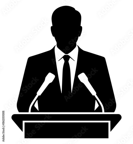 Silhouette of a speaker addressing an audience at a table