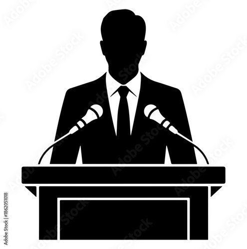 Silhouette of a speaker addressing an audience at a table
