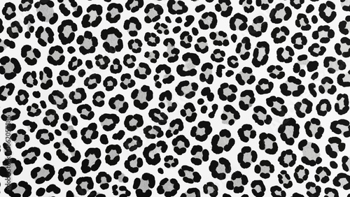 A close-up view of a black and white leopard print pattern on a fabric or textile