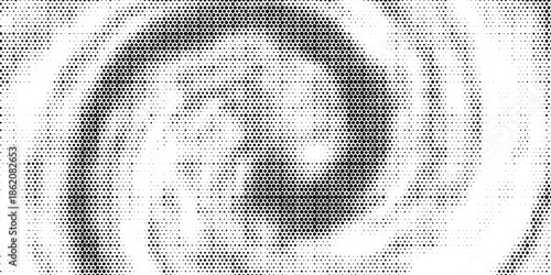 Abstract black and white background featuring a dynamic spiral pattern created with halftone dots. The swirling motion and dotted texture give a sense of movement, depth,