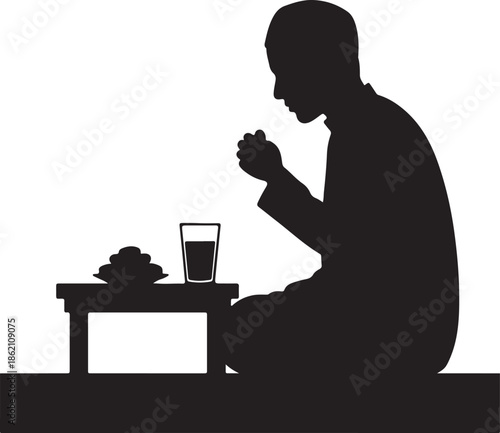 Silhouette of a Muslim man praying before breaking fast with dates and water isolated on white background