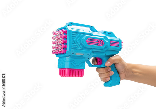 close-up macro of a tanned hand pulling the trigger of a high-gloss, sky blue futuristic bubble gun with neon pink accents, discharging iridescent bubbles on a white studio cyclorama background.