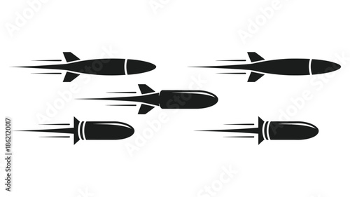 A collection of black silhouette missiles in flight with speed lines