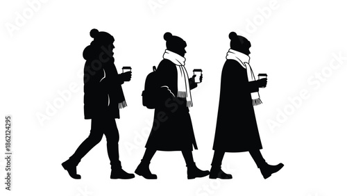 Three people walking with coffee cups in hand