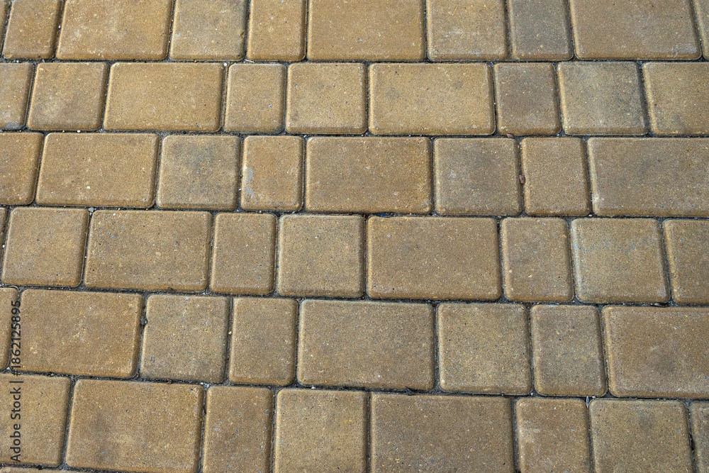Fototapeta premium yellow paving slabs close up