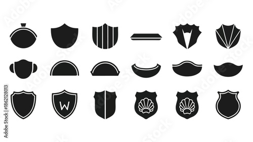 Collection of 16 black shield and crest icons on a white background, various shapes and designs.