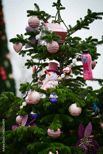 Christmas tree with festive decoration of snowman