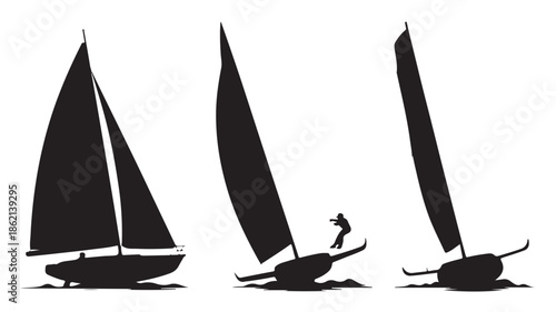 Sailboats Silhouettes on Water with Person Windsurfing
