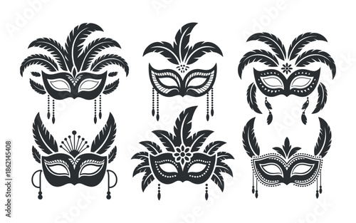 A collection of elegant black and white masquerade masks with decorative feathers and intricate designs