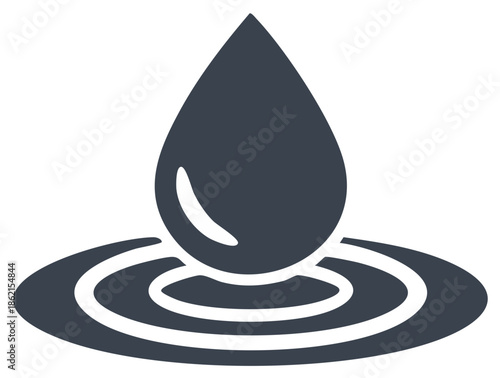 Water droplet falling into rippling water