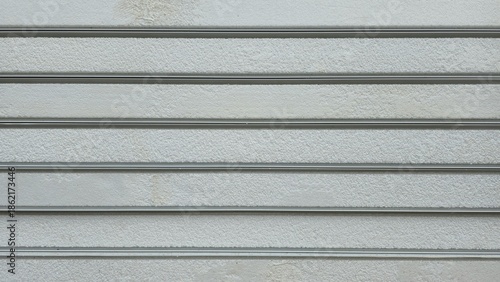Photos Grey insulated sandwich panel surface with clear horizontal lines