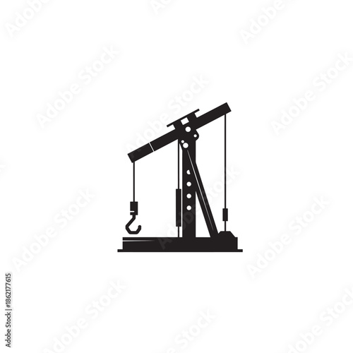 Black silhouette of an oil pump jack on a white background industry