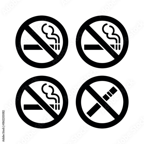 Four distinct prohibition signs forbid cigarette smoking.