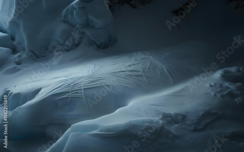 Close up view of the snow in the dark mountain which has some grass on the surface that makes the cold surface texture more realistic like a painting art