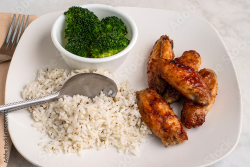chicken wings with  broccoli and rice