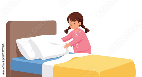 Responsible young girl in pink pajamas helps with household chores by neatly making her bed in the morning.