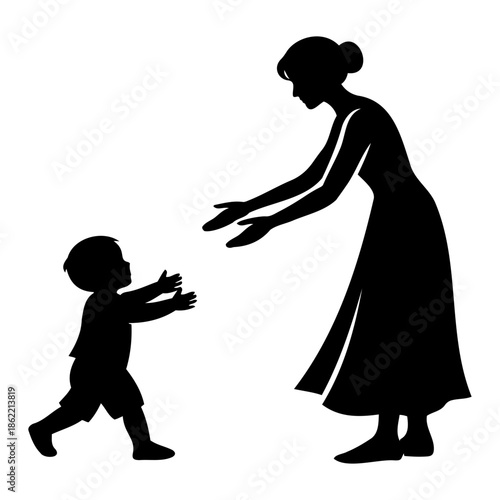 Silhouette of a caring mother reaching out to her young toddler taking his first steps.