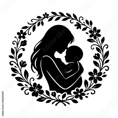 Elegant black and white silhouette of a mother tenderly holding her baby within a decorative floral wreath frame.