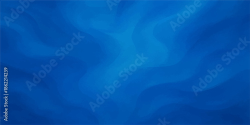 Soft blue silk waves flowing like water in an abstract background
